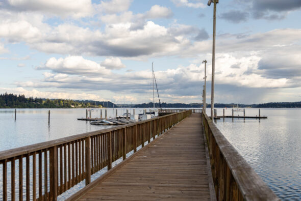 photo of wooden dock with boats in Silverdale, WA