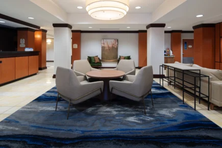 Modern lobby seating area at Fairfield Inn & Suites Bremerton with contemporary furniture and warm lighting in downtown Bremerton, Washington.