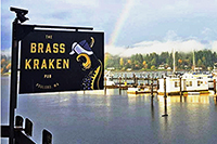 Photo of The Brass Kraken Pub sign and waterfront view