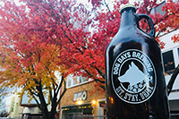 photo of beer growler outside of Dog Days Brewing