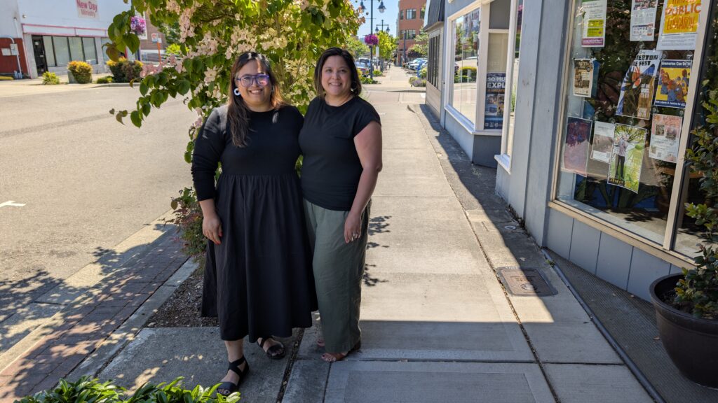 Aljolynn Sperber of Visit Kitsap Peninsula, left, and Irene Moyer of the Greater Kitsap Chamber & Visitor Centers stand together in downtown Bremerton.