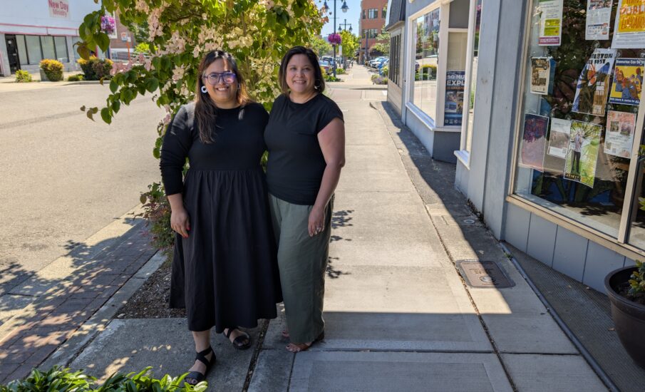 Aljolynn Sperber of Visit Kitsap Peninsula, left, and Irene Moyer of the Greater Kitsap Chamber & Visitor Centers stand together in downtown Bremerton.
